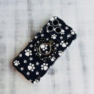 Black Paw Print pattern MagSafe phone grip ring with white paws on black background compatible with iPhone and Samsung