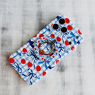 Cherry On Top pattern MagSafe phone grip ring with red cherries blue bows and gingham background compatible with iPhone and Samsung