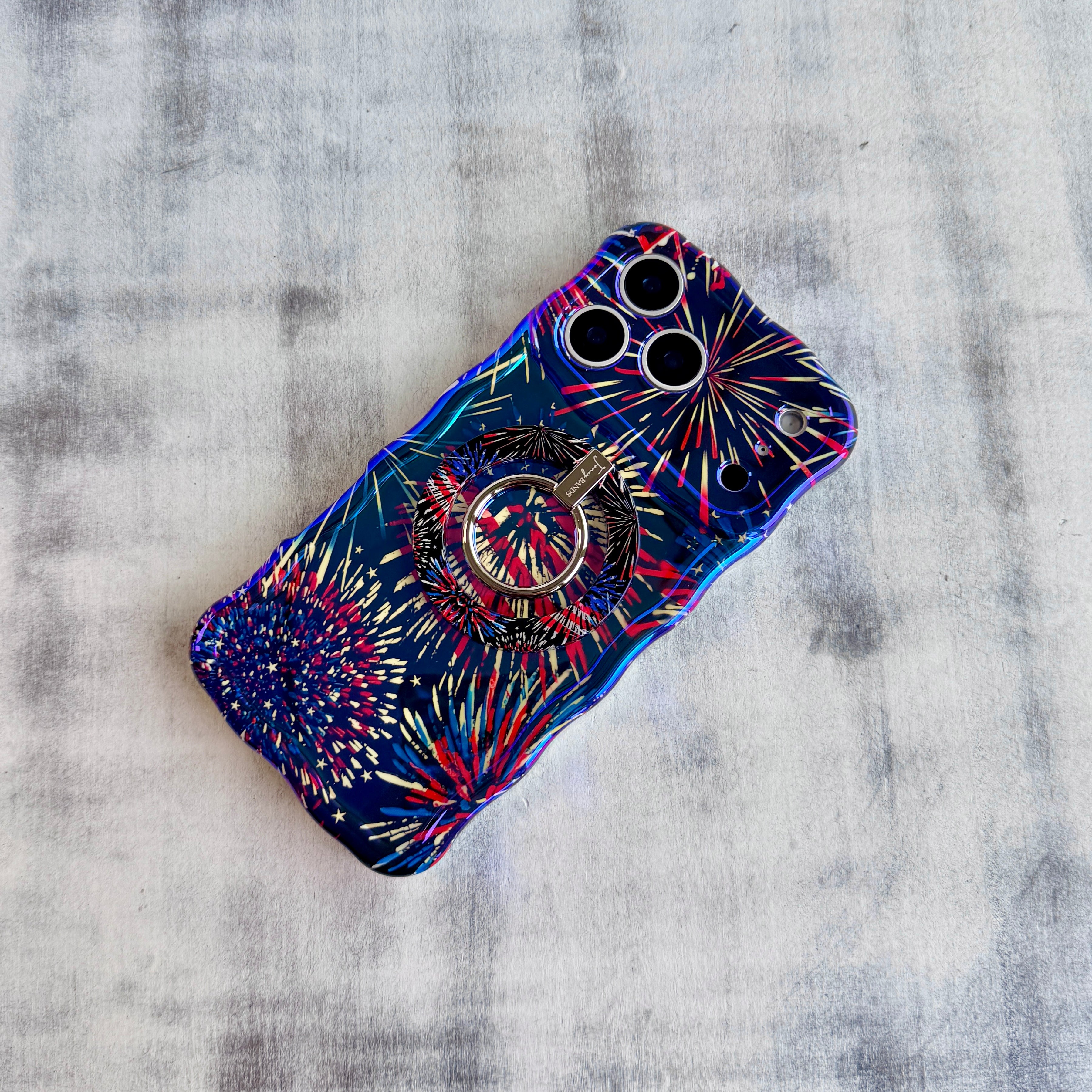 USA Fireworks patriotic pattern MagSafe phone grip ring with red white and blue fireworks on black background compatible with iPhone and Samsung