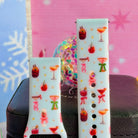 Close-up of both Holiday Spirits, Please? Samsung Galaxy Watch band straps with watercolor holiday cocktails and bows