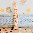 Falling in Love a Latte Samsung Galaxy Watch band standing full length against an illustrated latte and autumn leaf backdrop.