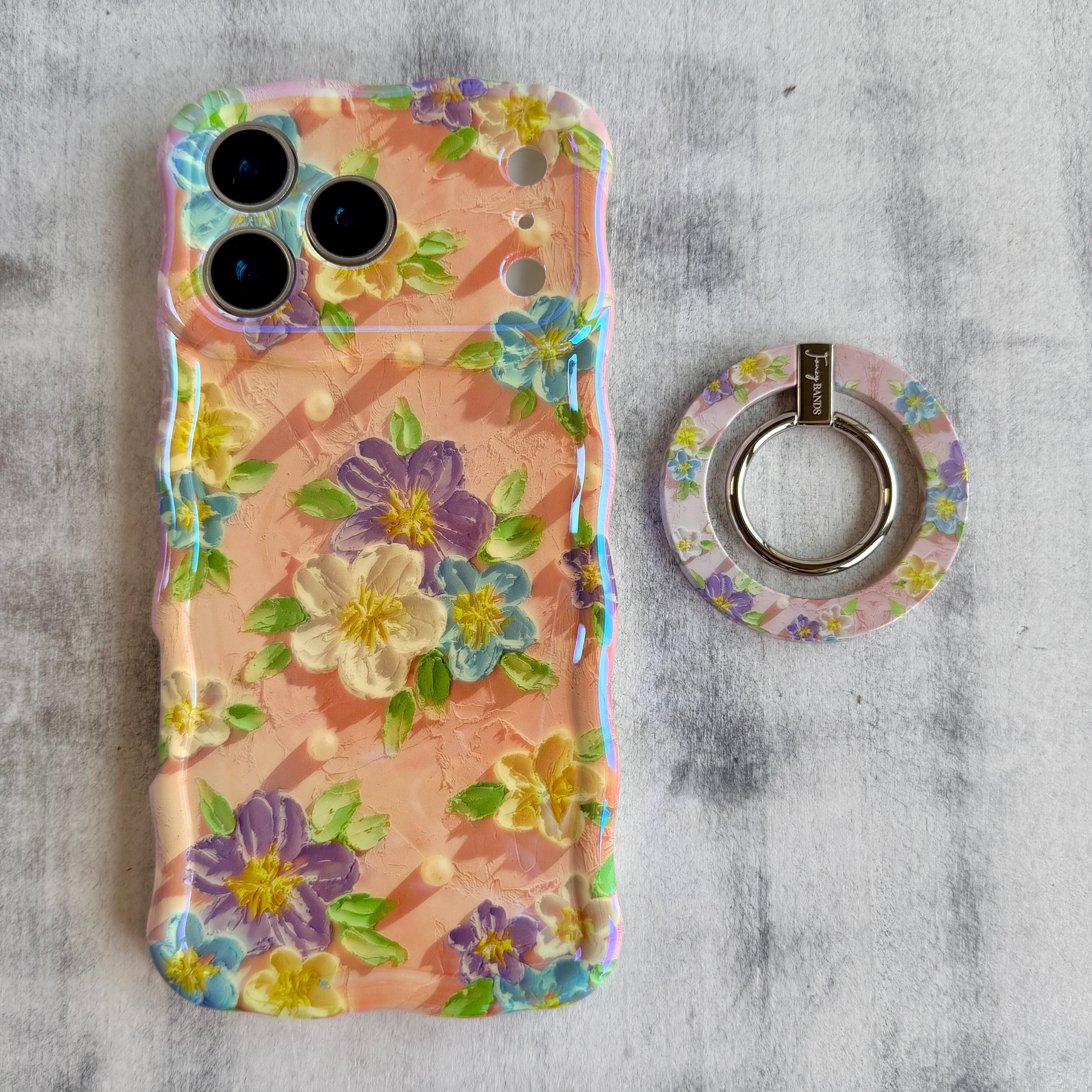 Blushing Bouquet textured oil painting style MagSafe phone grip ring with purple and yellow flowers on pink background compatible with iPhone and Samsung