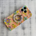 Blushing Bouquet textured oil painting style MagSafe phone grip ring with purple and yellow flowers on pink background compatible with iPhone and Samsung