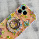 Blushing Bouquet textured oil painting style MagSafe phone grip ring with purple and yellow flowers on pink background compatible with iPhone and Samsung