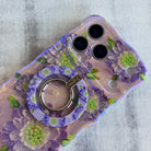 Purple Wildflower botanical pattern MagSafe phone grip ring with delicate purple pink and yellow flowers on white background compatible with iPhone and Samsung