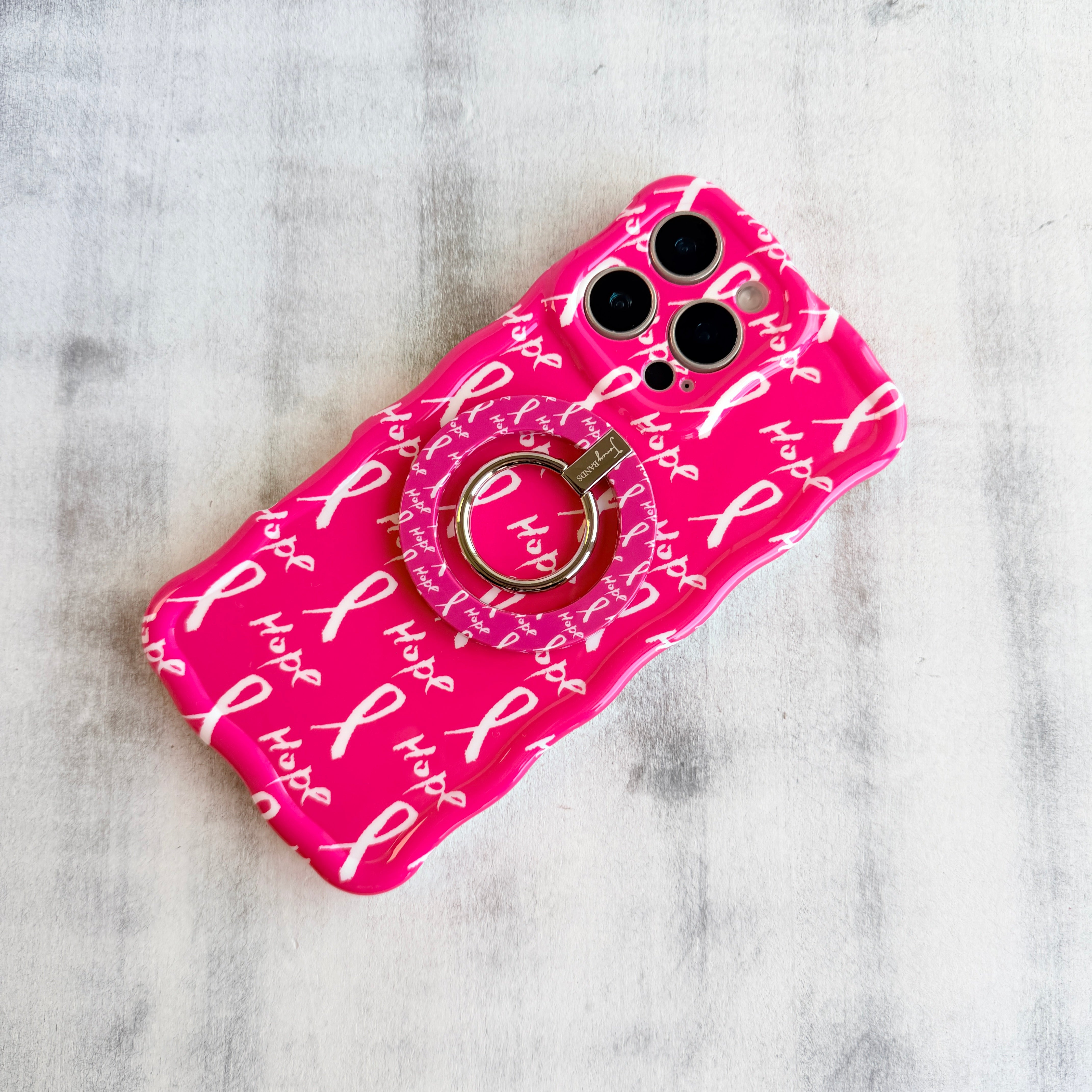 Hope Print MagSafe phone grip ring with pink background white awareness ribbons and hope text compatible with iPhone and Samsung