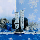 Snow Pretty In Blue Apple Watch band on a silver Apple Watch and as two straps on a black jewelry box, silvery bows, blue ribbon bows and navy snowflakes on icy blue