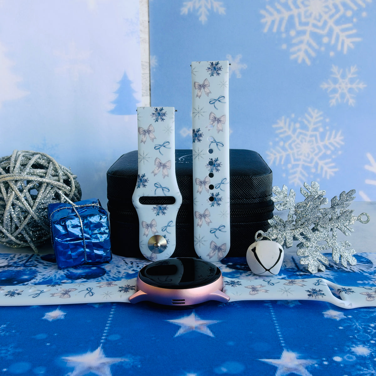 Snow Pretty In Blue Samsung Galaxy Watch band on a rose gold Galaxy Watch, with both straps on a black jewelry box