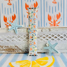 Coastal Catch Apple Watch band with orange lobsters, blue crabs, and yellow lemons on gray background with starfish decorations
