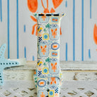 Coastal Catch Apple Watch band with orange lobsters, blue crabs, and yellow lemons on gray background with starfish decorations
