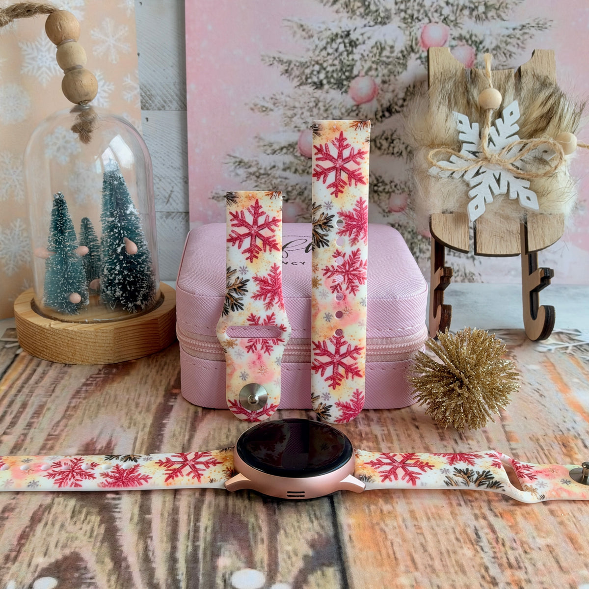 Champagne Snowfall Samsung Galaxy Watch band on a rose gold Galaxy Watch, with both straps on a pink jewelry box