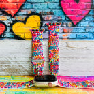 Love Riot Apple Watch band with colorful graffiti "LOVE" text in red, pink, yellow, blue, and turquoise with street art backdrop
