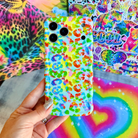 Wavy iPhone case featuring a vibrant neon rainbow leopard print with a high-gloss finish.