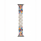 Mosaic Glow stainless steel Apple Watch band with multicolor glitter mosaic inlay in blue, pink, orange, and gold