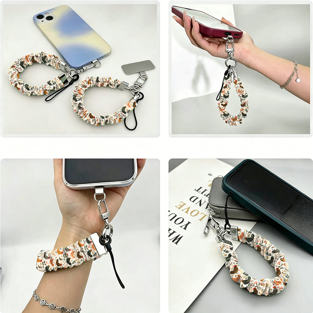 Fall Blooms autumn floral scrunchie phone wrist strap in orange and cream with silver clasp and phone attachment tab