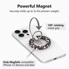 Jolly Wrist-mas MagSafe grip ring on a white iPhone: magnet holds up to 3x the phone's weight, 180 degree rotating silver ring, for MagSafe iPhone 12 and later