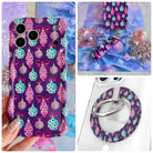 Just One More Ornament iPhone Matching Set - plum MagSafe case with pink and aqua watercolor Christmas ornaments, matching Hold It Fancy grip ring and scrunchie phone wrist strap from Fancy Bands