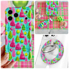 Merry & Bright, Totally! iPhone Matching Set - aqua MagSafe case with hot pink and lime bottle-brush Christmas trees, matching Hold It Fancy grip ring and scrunchie phone wrist strap from Fancy Bands