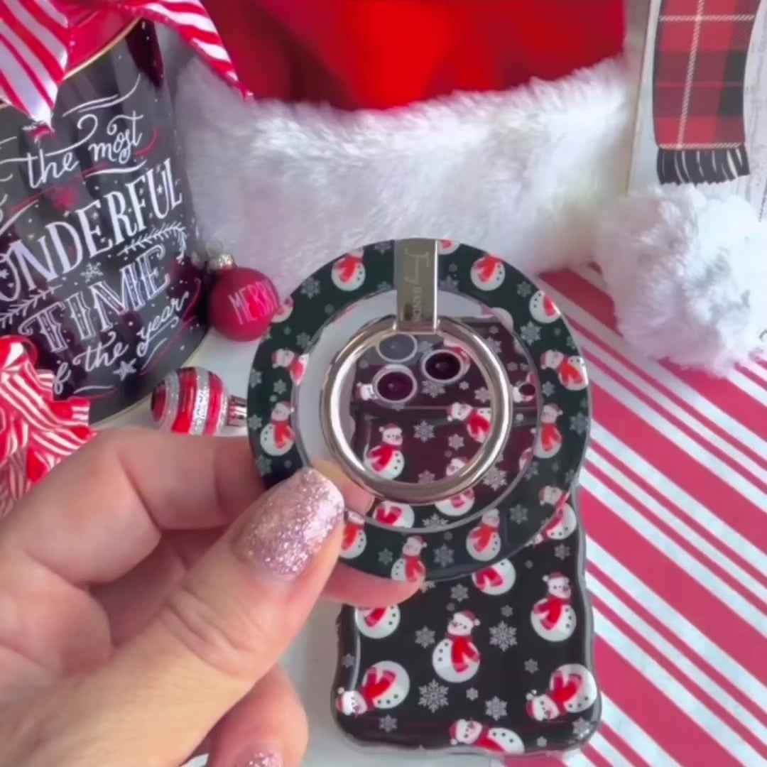 Video: the Snowman matching set, snapping the MagSafe grip ring onto the case, then wearing the matching scrunchie phone wrist strap