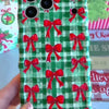Video: turning the Plaid Tidings & Bows Wavy Luxe iPhone case in hand to show the green gingham, red bows and glossy wavy edges