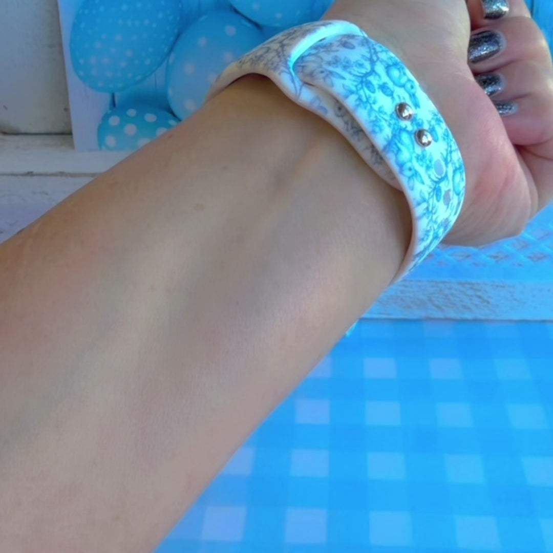 Bluebell Bunny Apple Watch band with blue floral pattern and bunny silhouettes on white background with blue balloons
