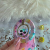 Colorful disco ball pattern MagSafe phone grip ring and stand on pink background compatible with iPhone and Samsung