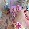 Video: Champagne Snowfall Samsung Galaxy Watch band worn on the wrist, then both straps shown on a pink jewelry box