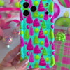Video: turning the Merry & Bright, Totally! Wavy Luxe iPhone case in hand to show the pink and lime Christmas tree print and glossy wavy edges