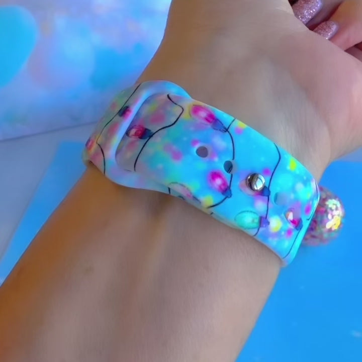Video: Twinkle All The Way Samsung Galaxy Watch band worn with a rose gold Galaxy Watch, then both straps on a pink jewelry box