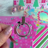 Video: snapping the Peppermint Cutie MagSafe grip ring onto the matching case and using the silver ring as a finger grip
