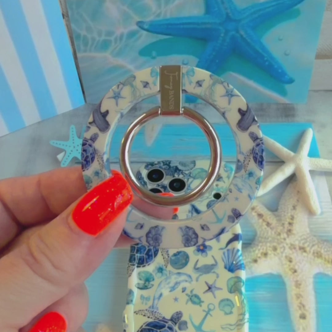 Blue Lagoon nautical watercolor MagSafe phone grip ring with sea turtles, whales, and jellyfish in shades of blue on a white background compatible with iPhone and Samsung