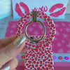 Leopard Crush pattern MagSafe phone grip ring with vibrant pink and red leopard spots on white background compatible with iPhone and Samsung