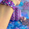 Video: Just One More Ornament Apple Watch band worn on the wrist, then both ornament-print straps shown on a pink jewelry box