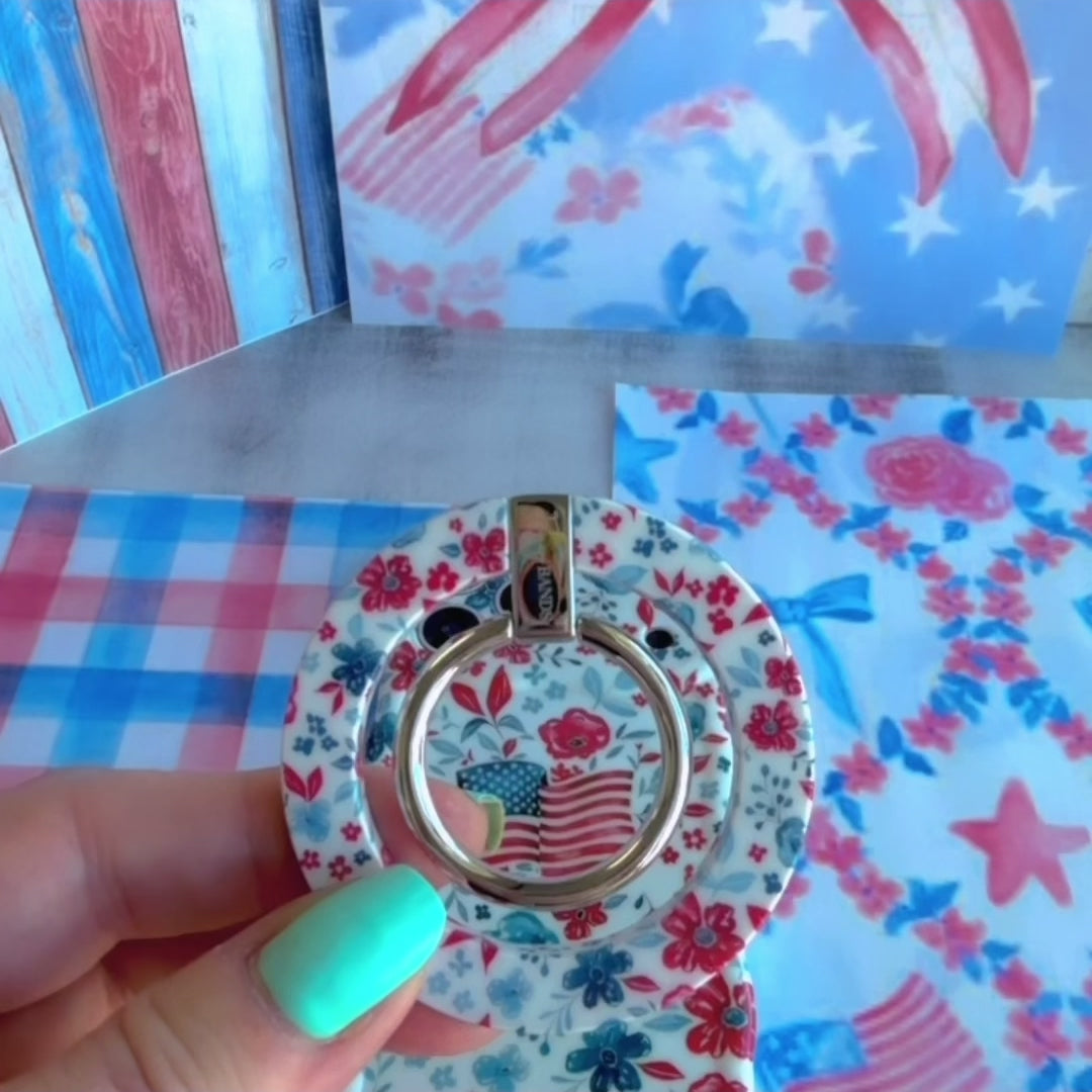 Red White and Bloom patriotic floral MagSafe phone grip ring with red navy and light blue watercolor flowers on a white background compatible with iPhone and Samsung