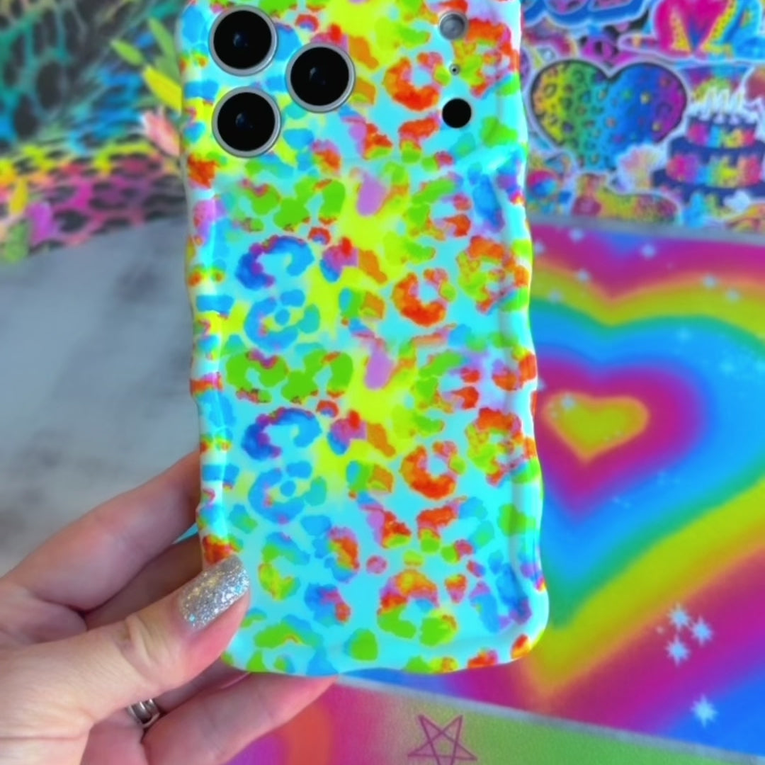 Wavy iPhone case featuring a vibrant neon rainbow leopard print with a high-gloss finish.