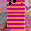 Wavy iPhone case featuring alternating horizontal stripes of hot pink and bright orange with a glossy finish.