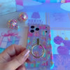 Video: No Peeking, Darling grip ring shown close up, snapped onto the matching case and held with one finger through the silver ring