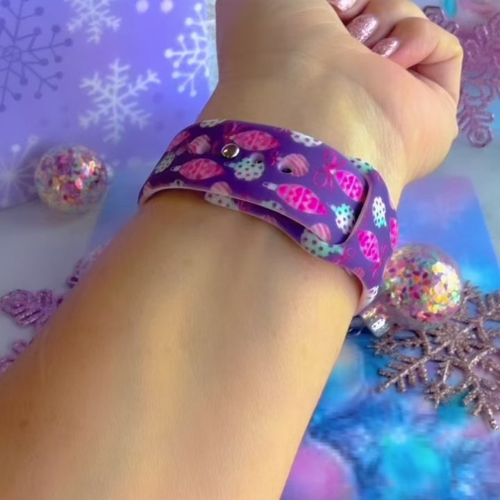Video: Just One More Ornament Samsung Galaxy Watch band worn on the wrist, then both straps shown on a pink jewelry box