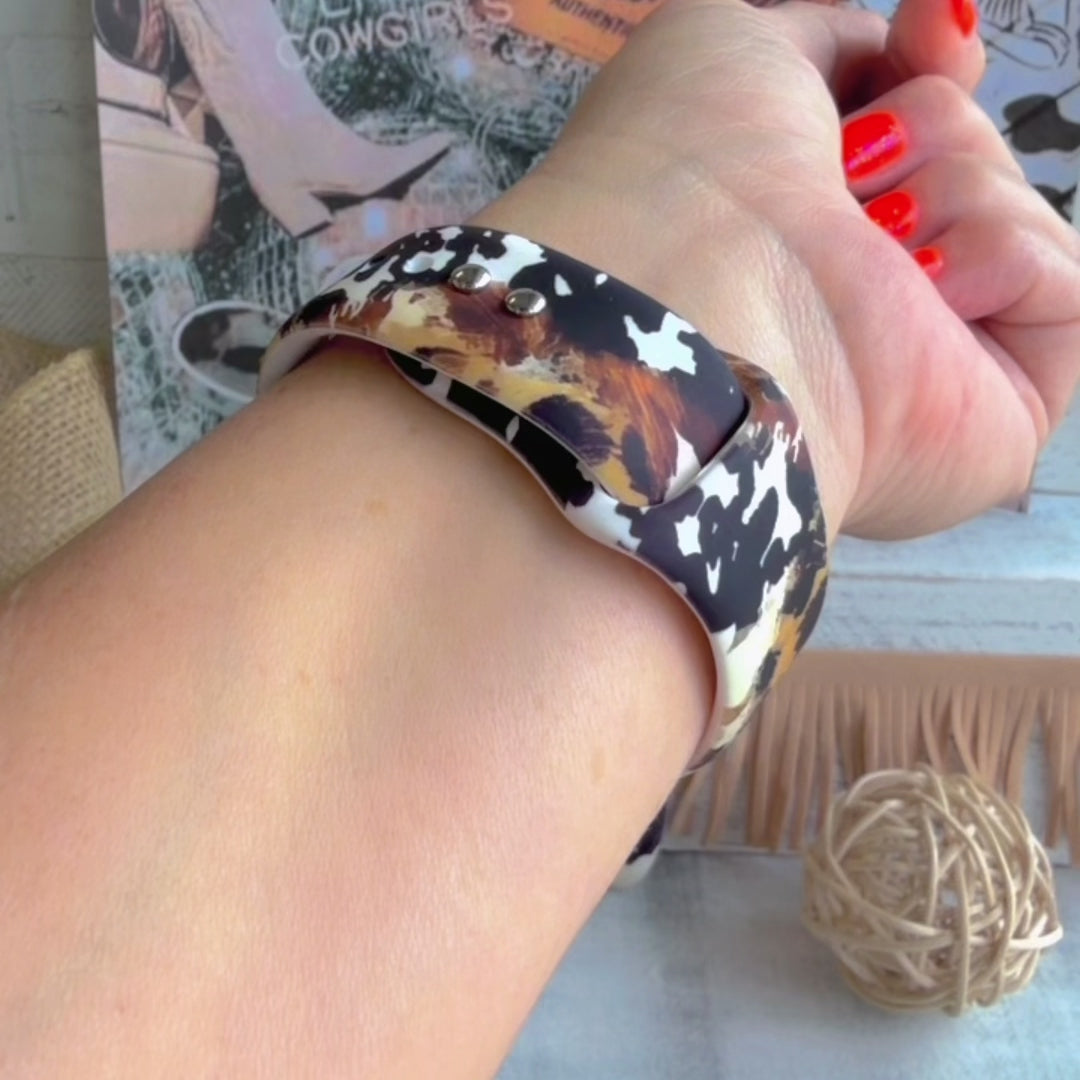 Rodeo Wild Apple Watch band with cowhide and leopard print patterns in brown, black, and cream with Western decor

