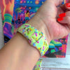 Roller Girl Apple Watch band with colorful roller skates on neon yellow background with disco ball and retro skate decorations