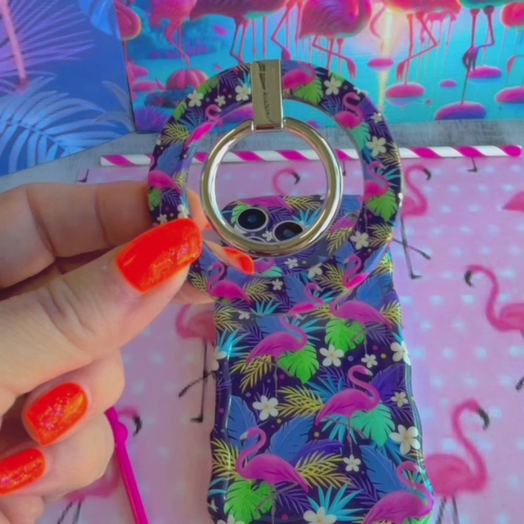 It's Giving Flamingo tropical pattern MagSafe phone grip ring with pink flamingos and colorful exotic leaves on a dark background compatible with iPhone and Samsung