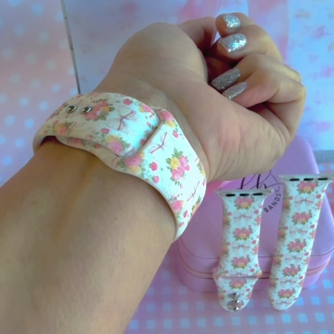 Ribbons & Roses Apple Watch band with pink roses and ribbon bows on cream background with pink rose and ribbon decorations
