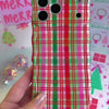 Video: turning the Merry Little Plaid Wavy Luxe MagSafe iPhone case in hand to show the pink, red and green plaid and wavy edges