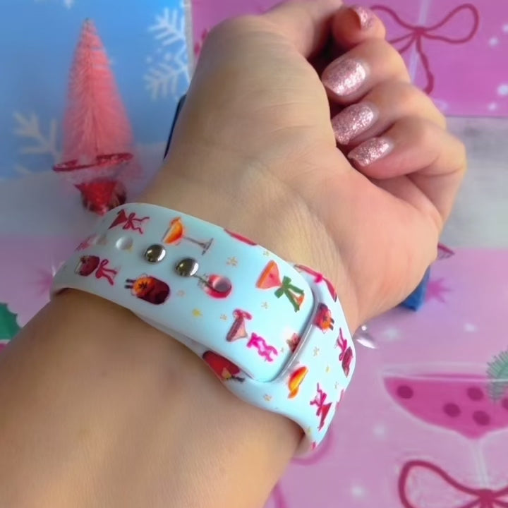 Video: Holiday Spirits, Please? Apple Watch band worn on the wrist, then both Christmas cocktail straps shown on a jewelry box