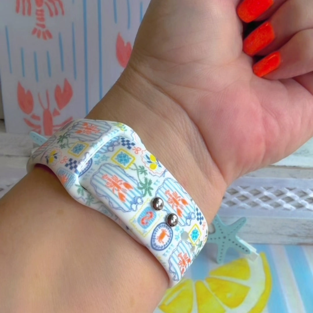 Coastal Catch Apple Watch band with orange lobsters, blue crabs, and yellow lemons on gray background with starfish decorations
