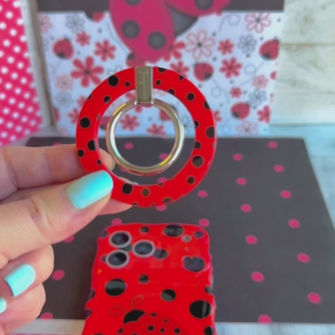 Ladybug pattern MagSafe phone grip ring with black polka dots on a vibrant red background compatible with iPhone and Samsung