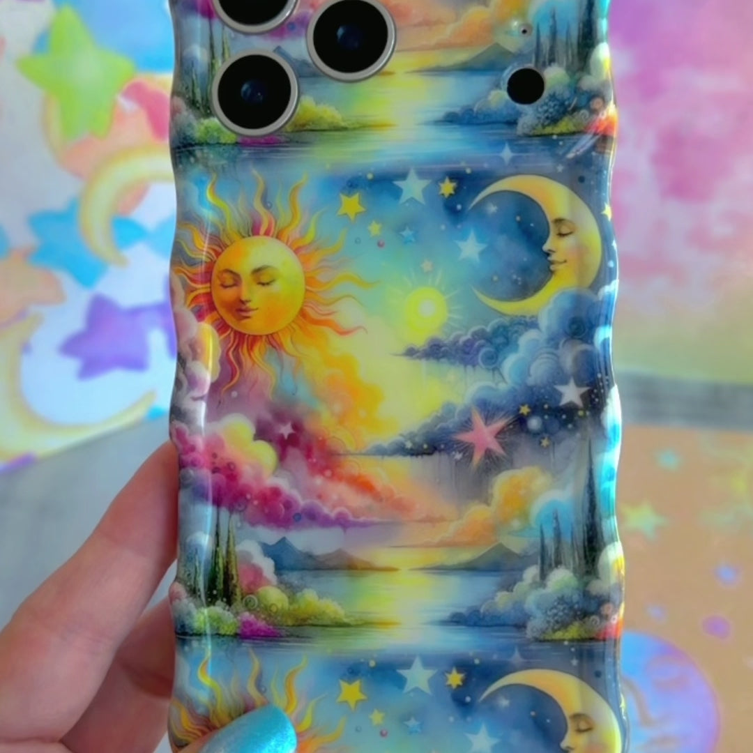Trendy wavy iPhone case featuring a vibrant celestial surrealism design of a golden sun, crescent moon, and pastel watercolor clouds with a high-gloss finish.