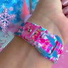Video: Sugarplum Square Samsung Galaxy Watch band worn on the wrist, then both straps shown on a pink jewelry box