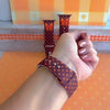 Video of the Spotted Looking Cute Apple Watch band showing the chocolate brown silicone, pumpkin-orange polka dots, and orange bow from every angle.