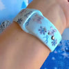 Video: Snow Pretty In Blue Samsung Galaxy Watch band worn on the wrist, then both straps shown on a jewelry box